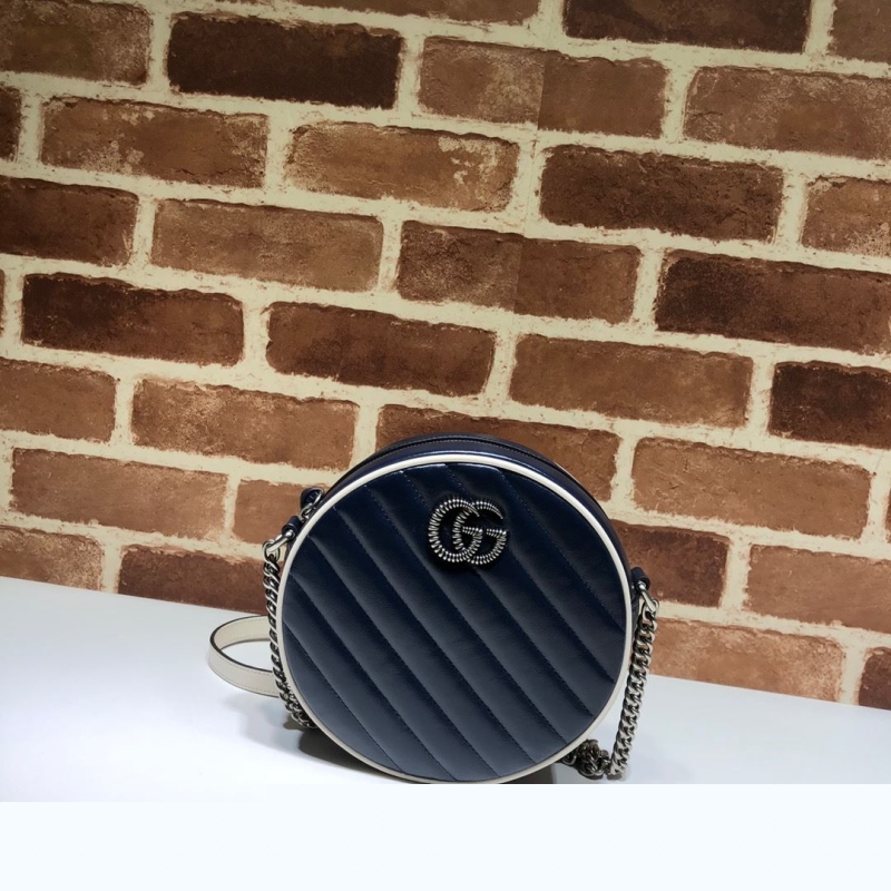 G*u*i round bags